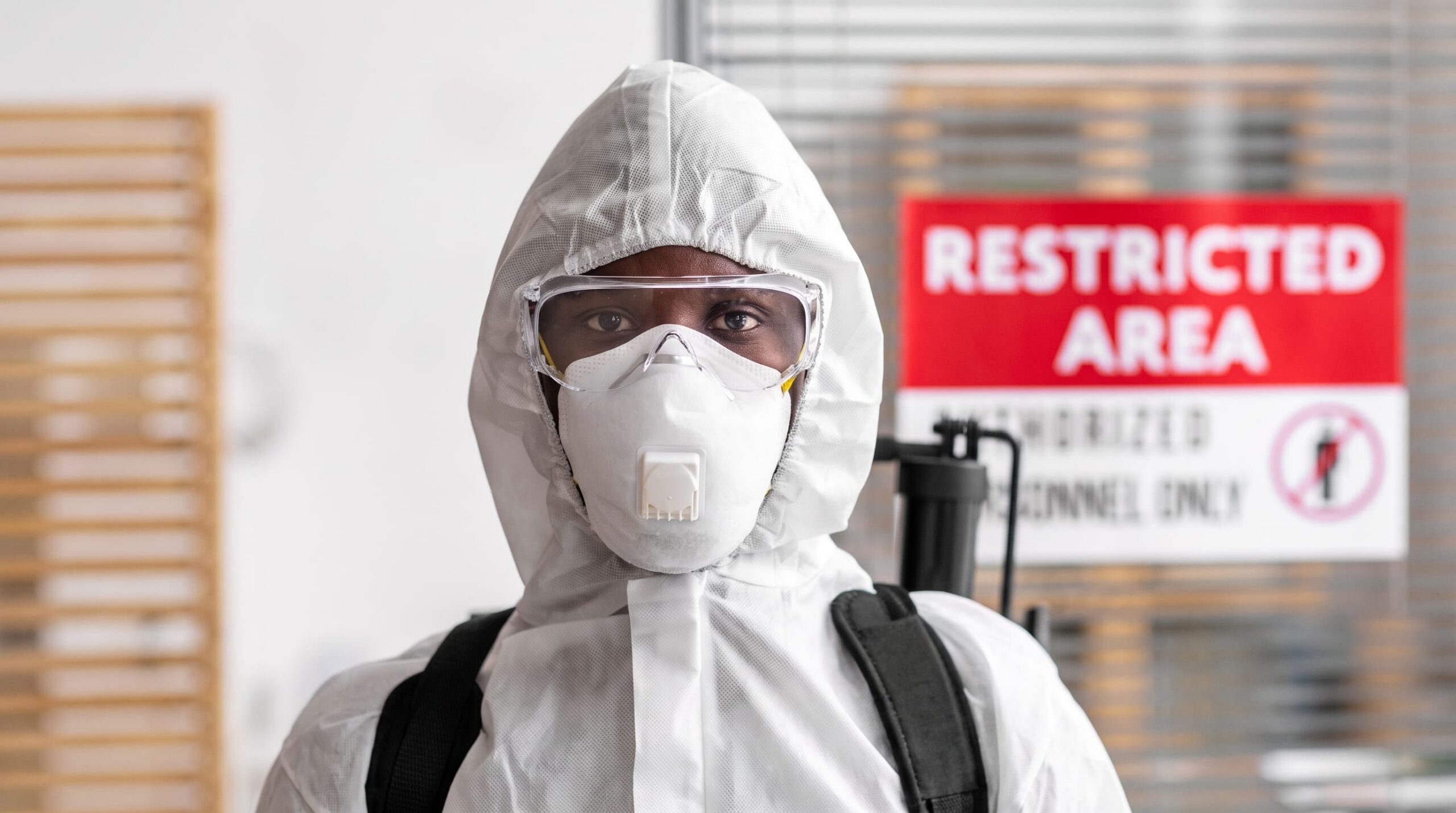 Person_in_hazmat_suit_restricted…
